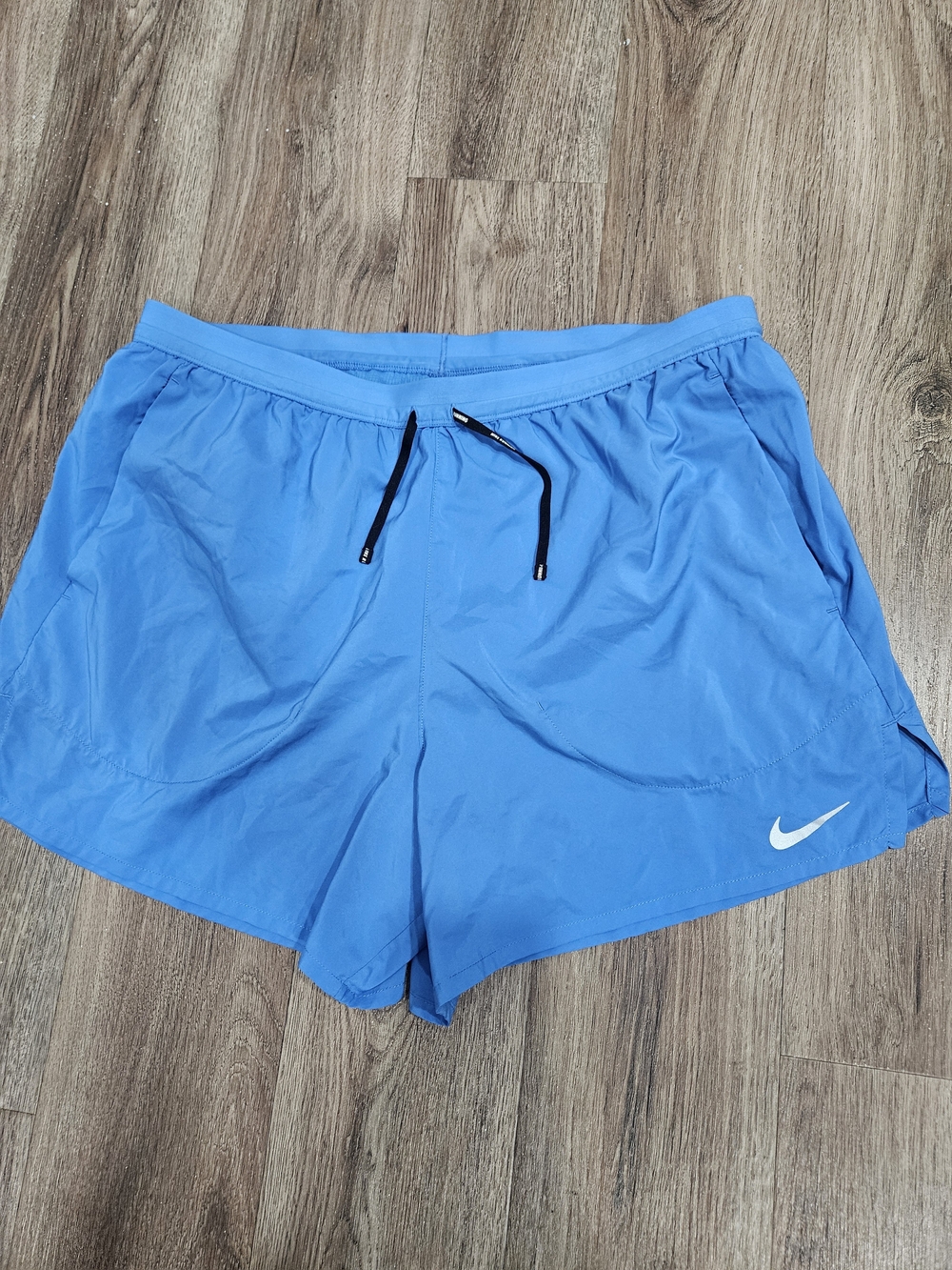 Nike Men’s Light Blue Athletic Shorts with White Swoosh